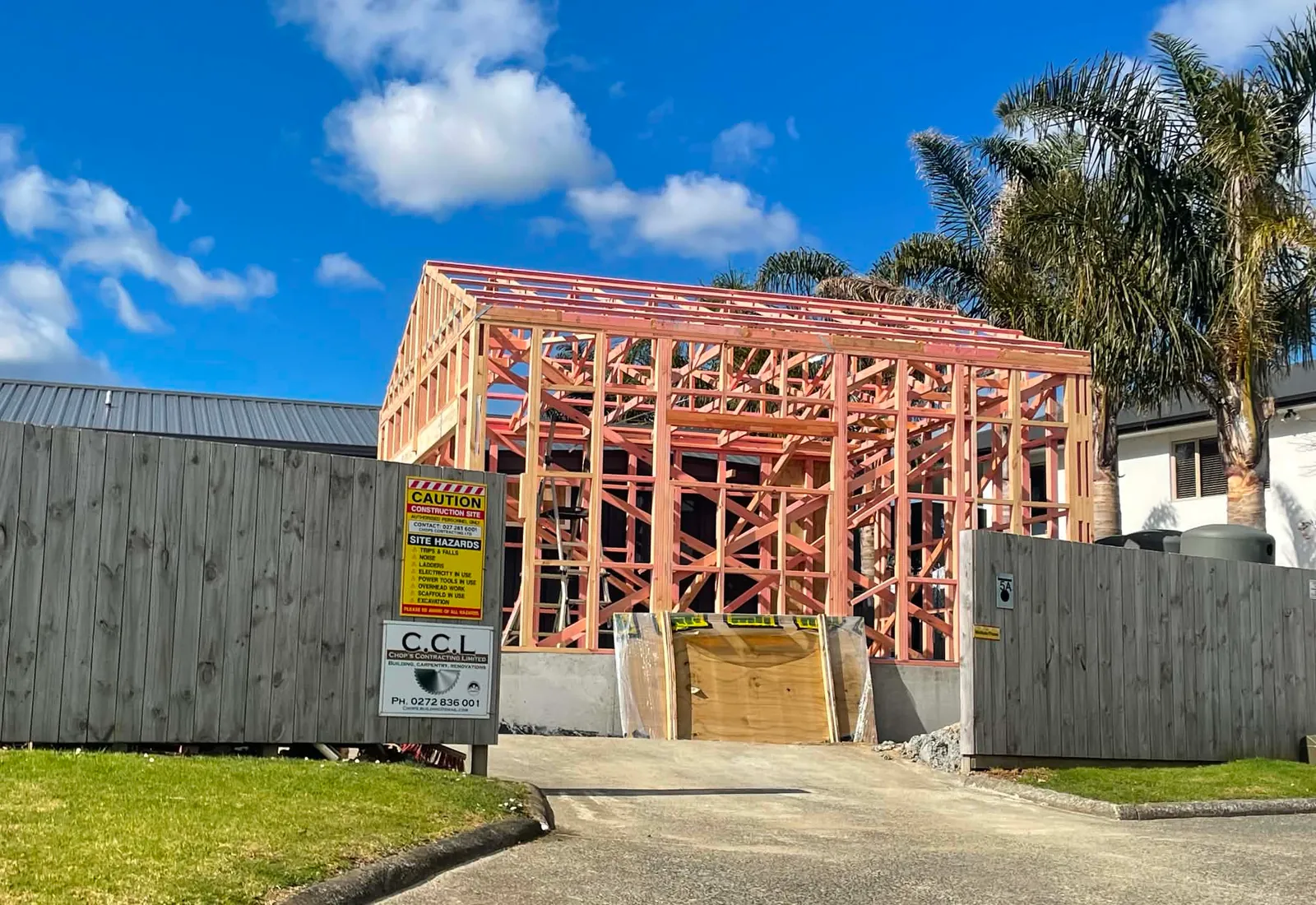 Framing in progress, viewed from the street with the CCL site signage on the boundary