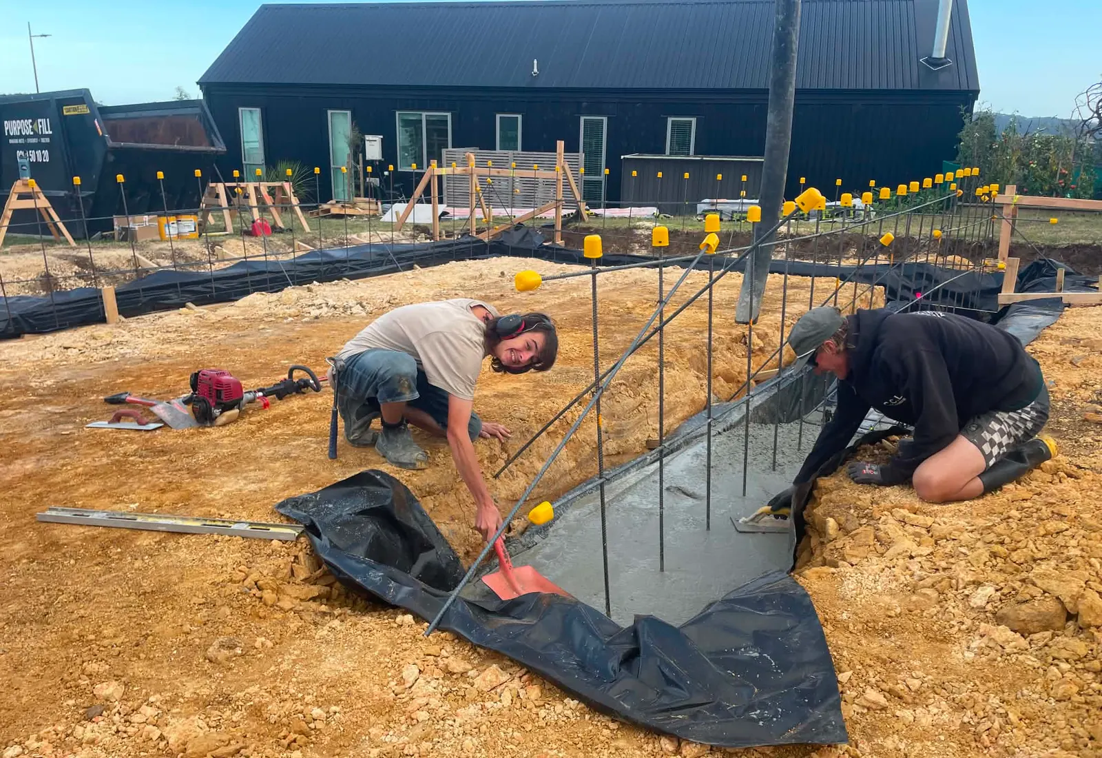Crew on site placing reinforcing for the concrete slab