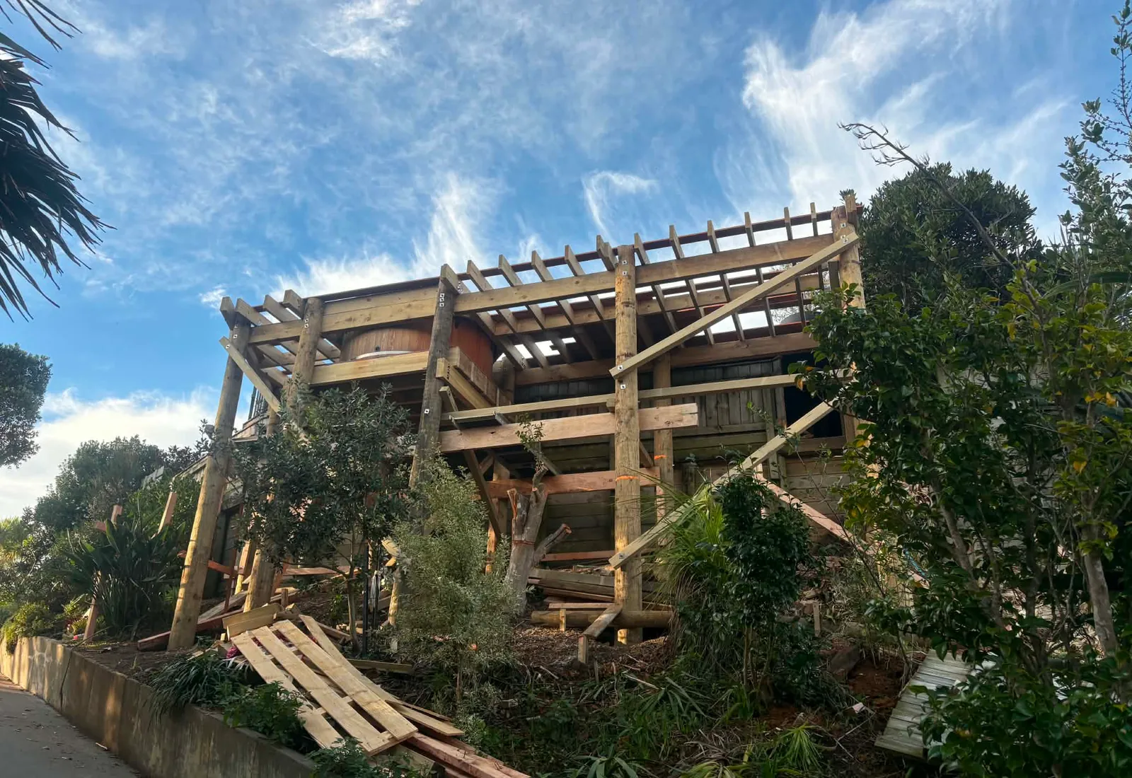 Deck framing from below, with joists installed and ready for the hardwood surface
